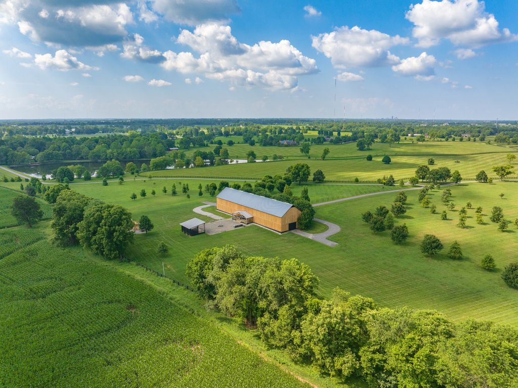 Barn and outbuildings among open farmland near Lexington