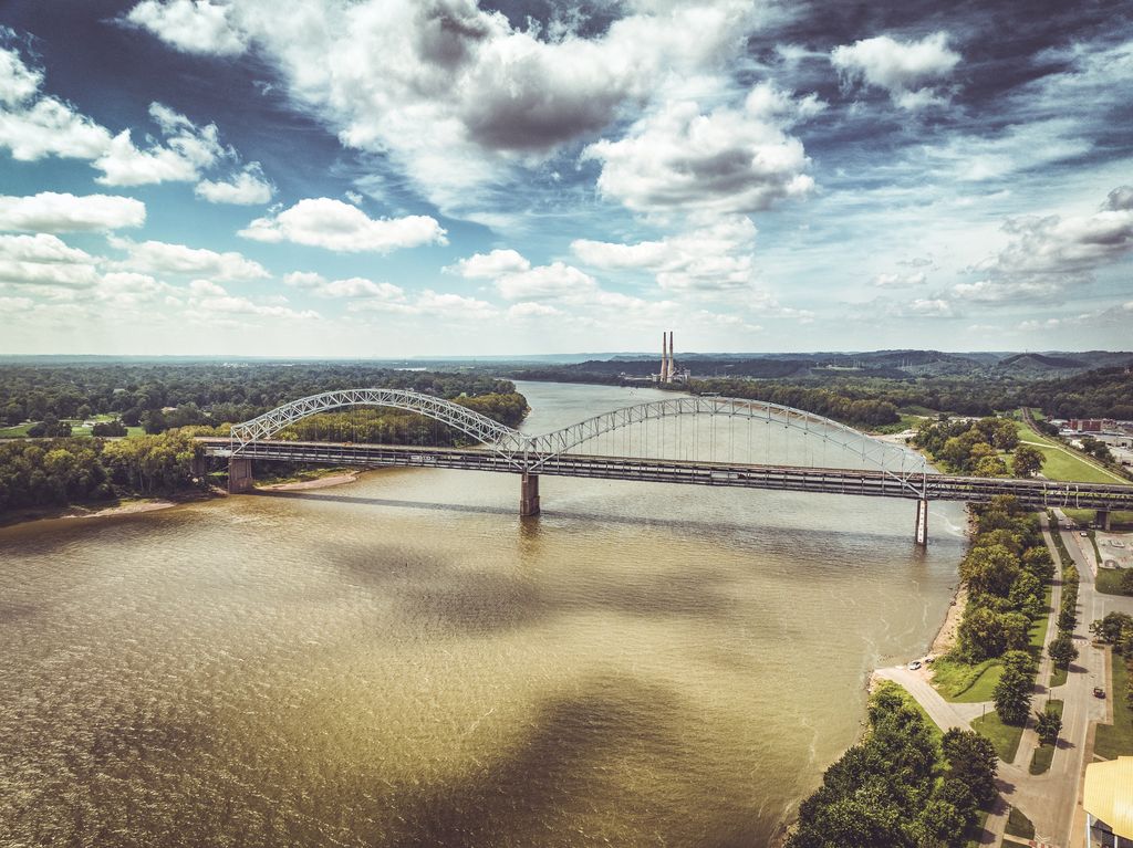 The Sherman Minton Bridge over the Ohio River at New Albany under dramatic clouds